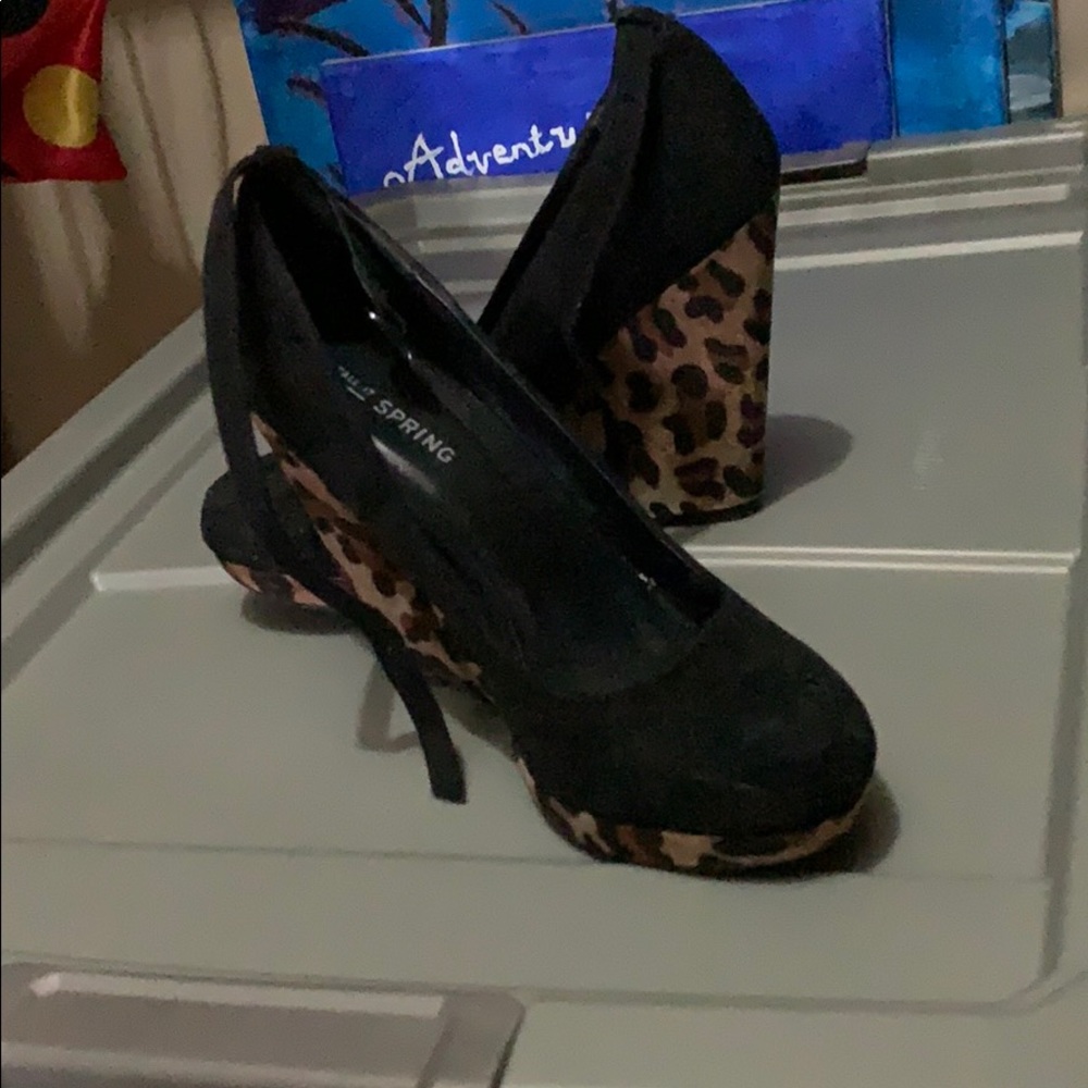 Cheetah size 6 1/2 wedges . Lightly worn .